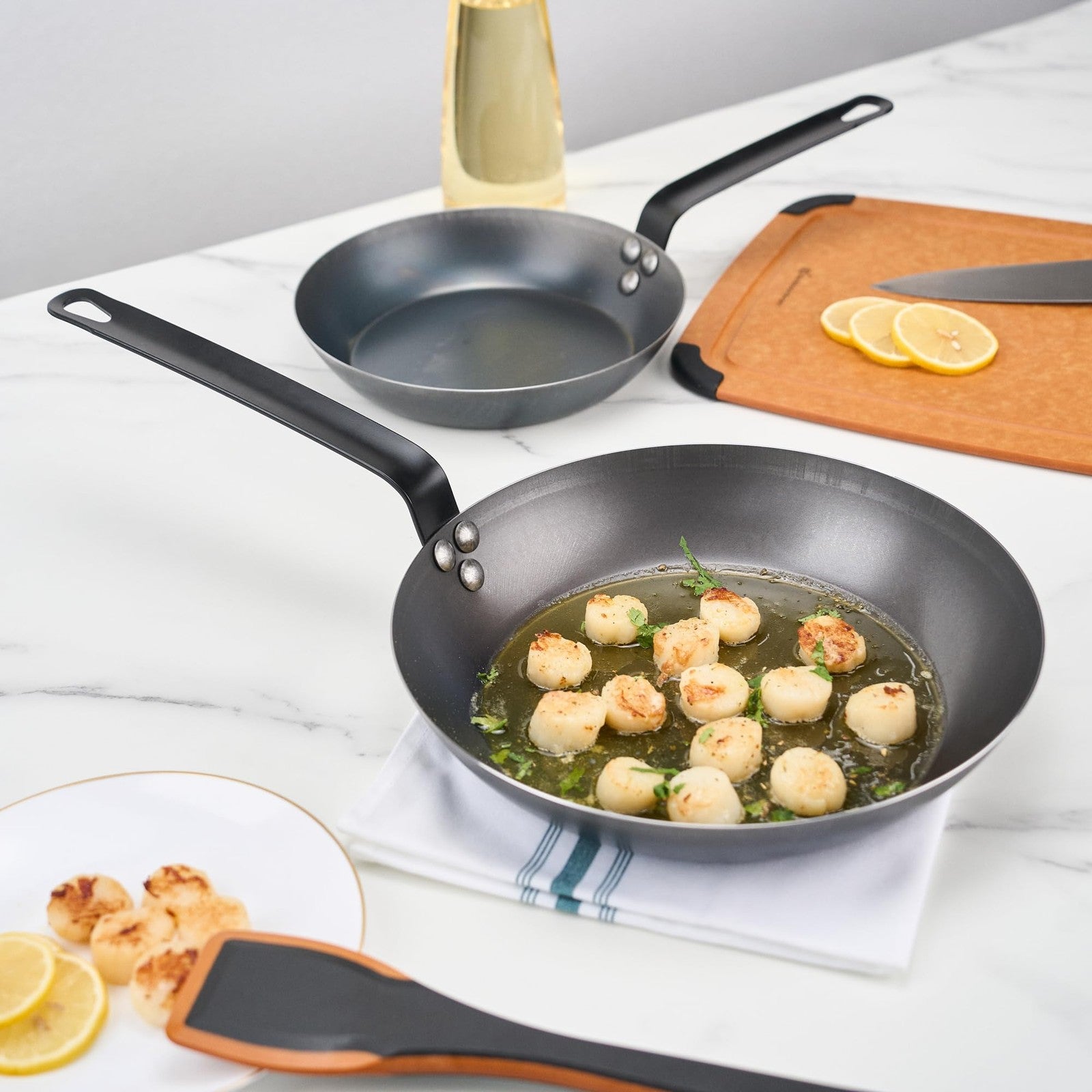 Met Lux 11-inch lightweight frying pan by Restaurantware, induction-ready with triple-rive design, shown from above with a non-stick surface.