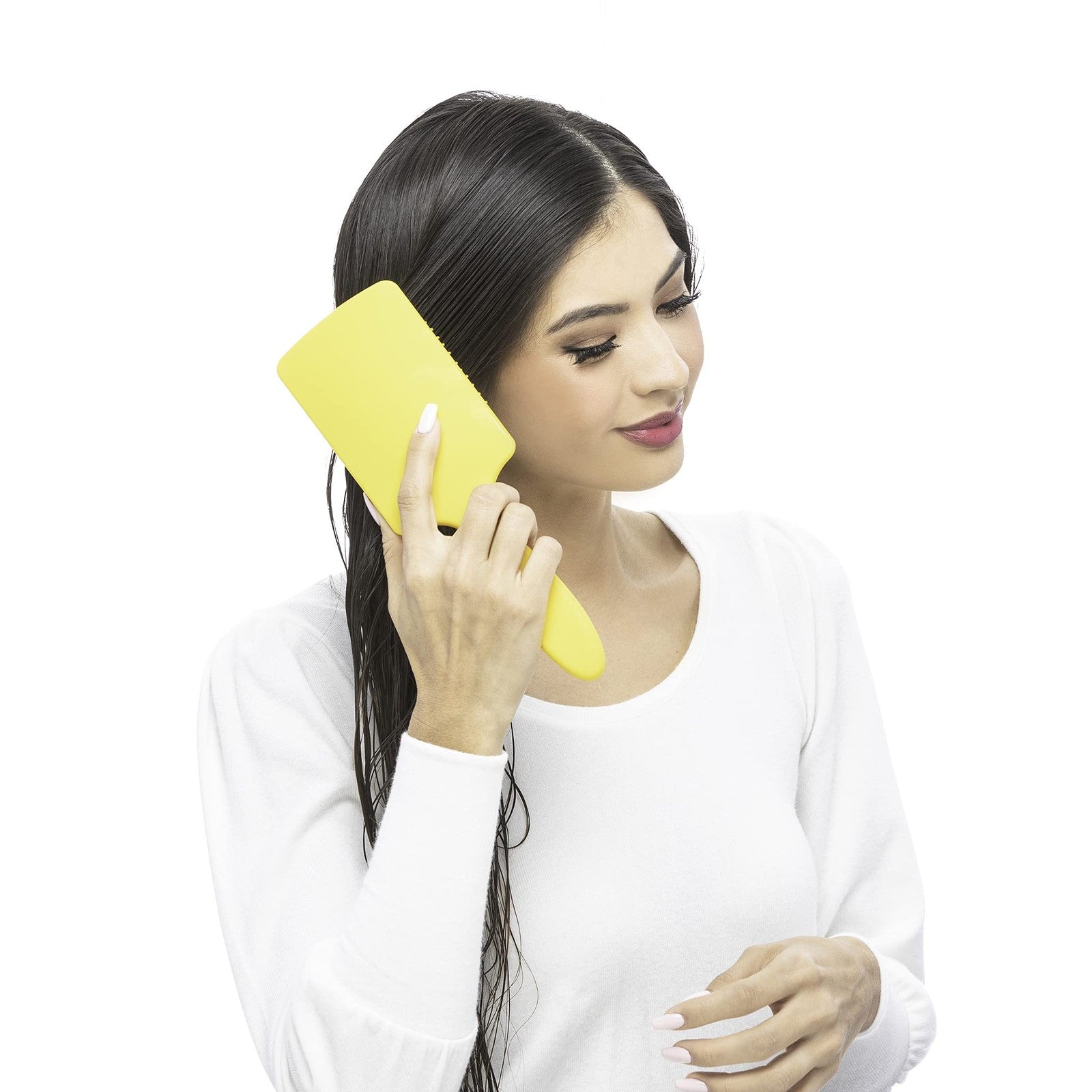 Drybar The Lemon Bar paddle brush with yellow handle and bristles, designed for detangling and smoothing hair.