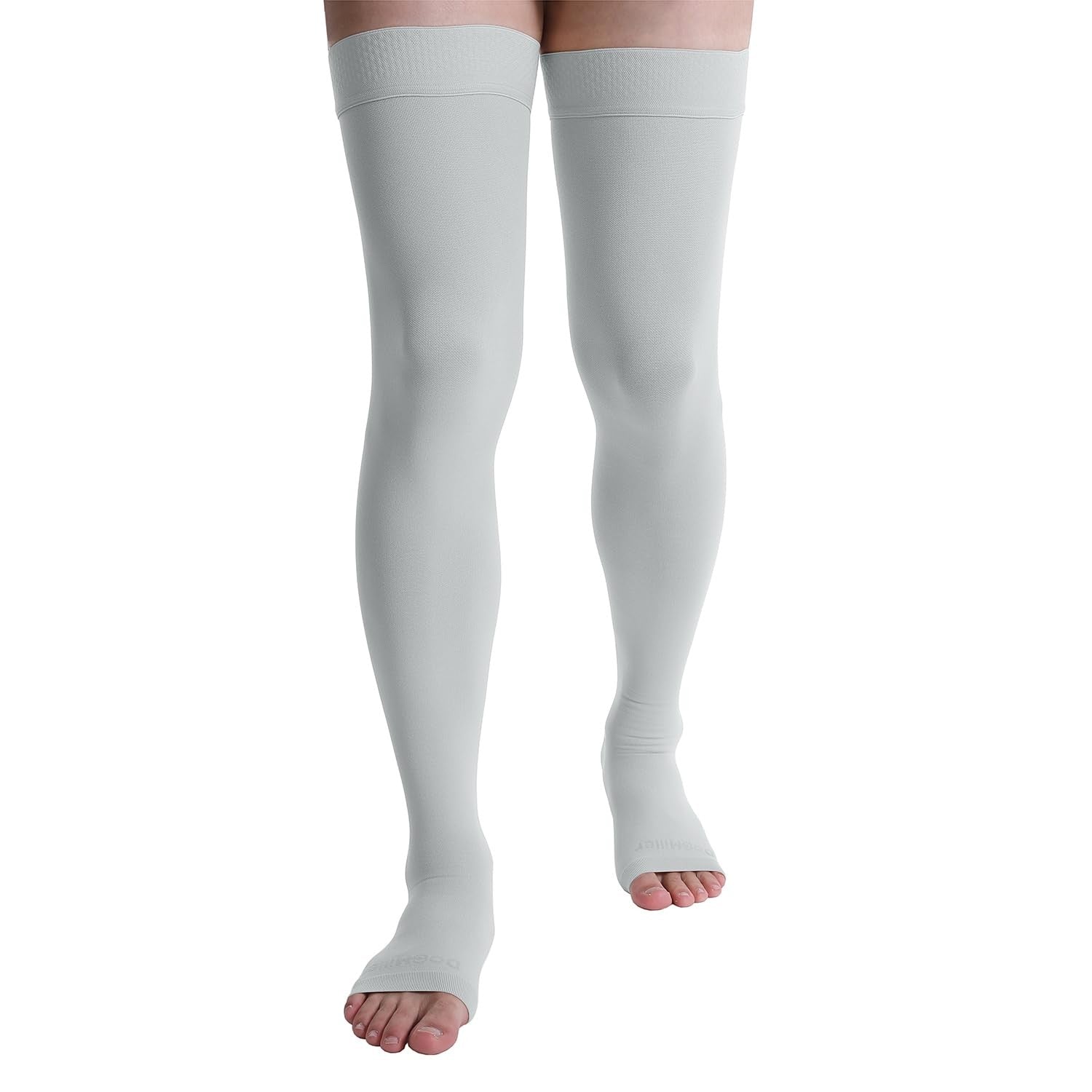 Open toe Doc Miller thigh high compression socks with 20-30mmHg for varicose vein support, shown on a model's legs.