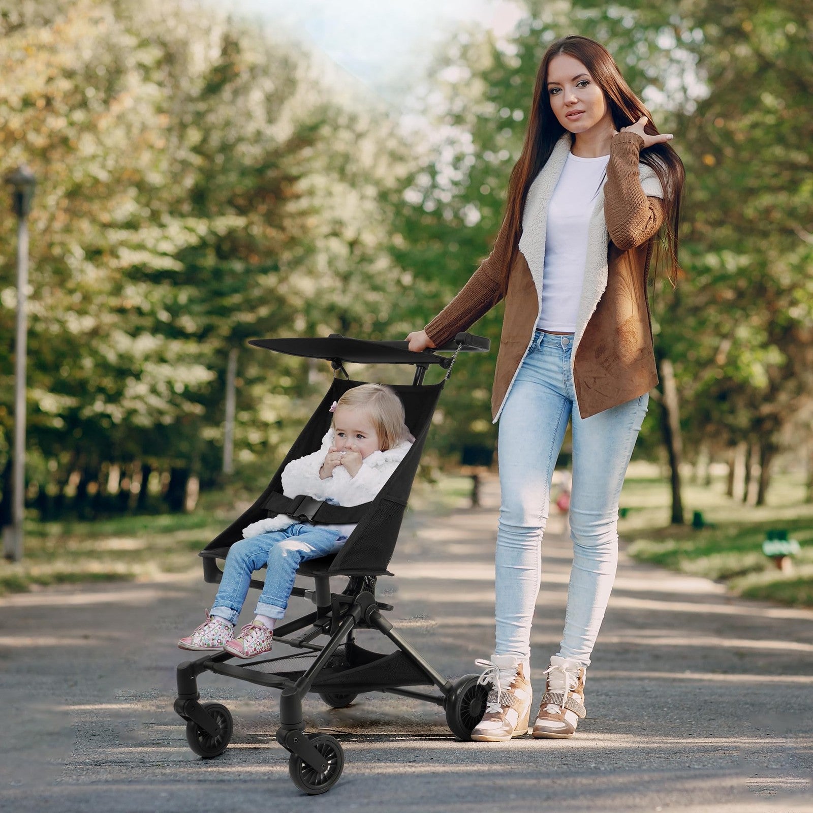 Peekabu lightweight travel stroller for airplane, compact foldable baby stroller weighing 10.5 lbs, ideal for travel and easy to carry.