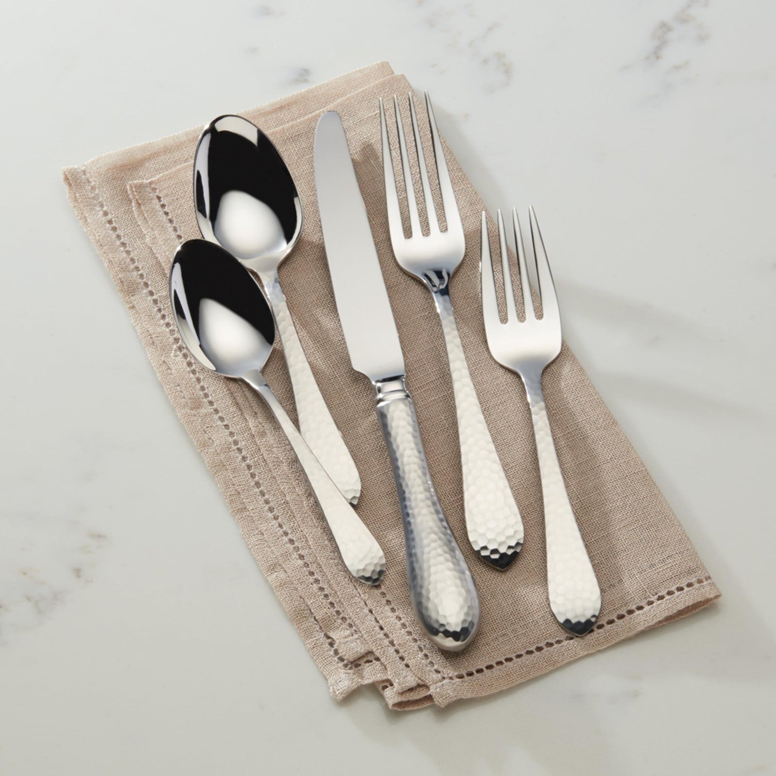 Reed & Barton hammered antique silverware set with 5-piece flatware place setting, including fork, knife, and spoon.