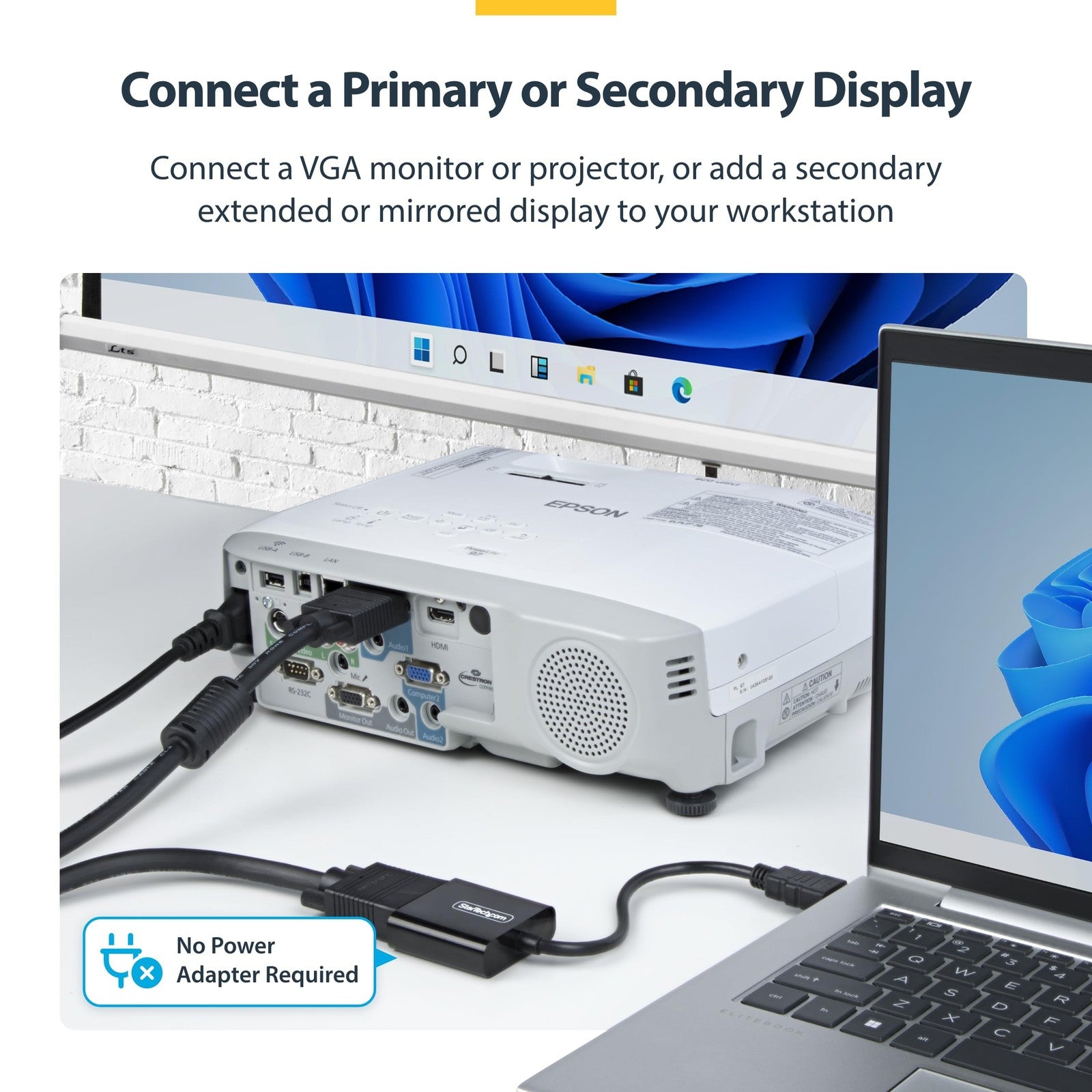 StarTech.com HDMI to VGA adapter converting laptop or desktop HDMI output to VGA display with active video conversion.