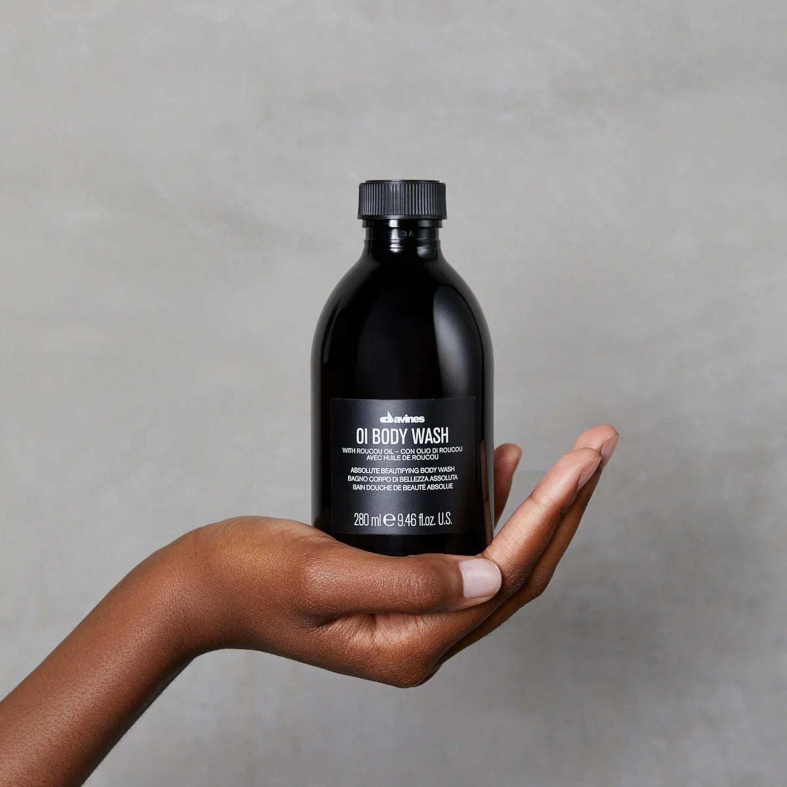 Davines OI Body Wash in 9.47 oz bottle, featuring hydrating formula with Roucou oil for gentle cleansing and hydration.