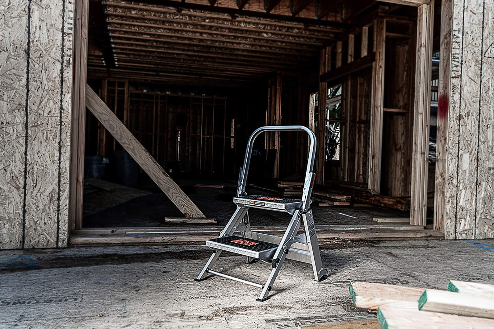 Little Giant Safety Step 2-step aluminum ladder with 2-foot height and Type 1A rating, shown as a sturdy step stool.