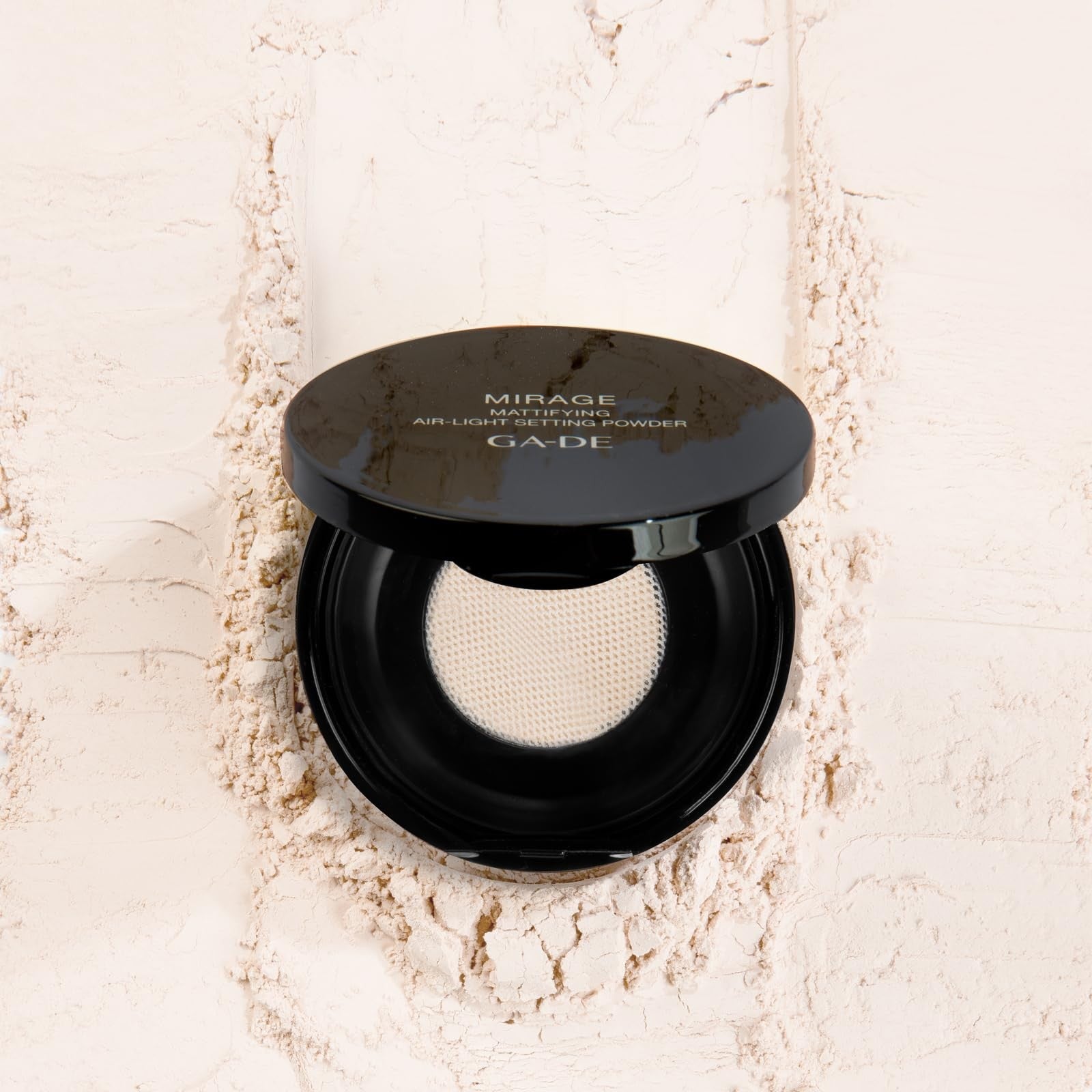 GA-DE Mirage Matifying Air-Light Setting Powder for a shine-free, flawless finish in a loose powder container with a clear lid.