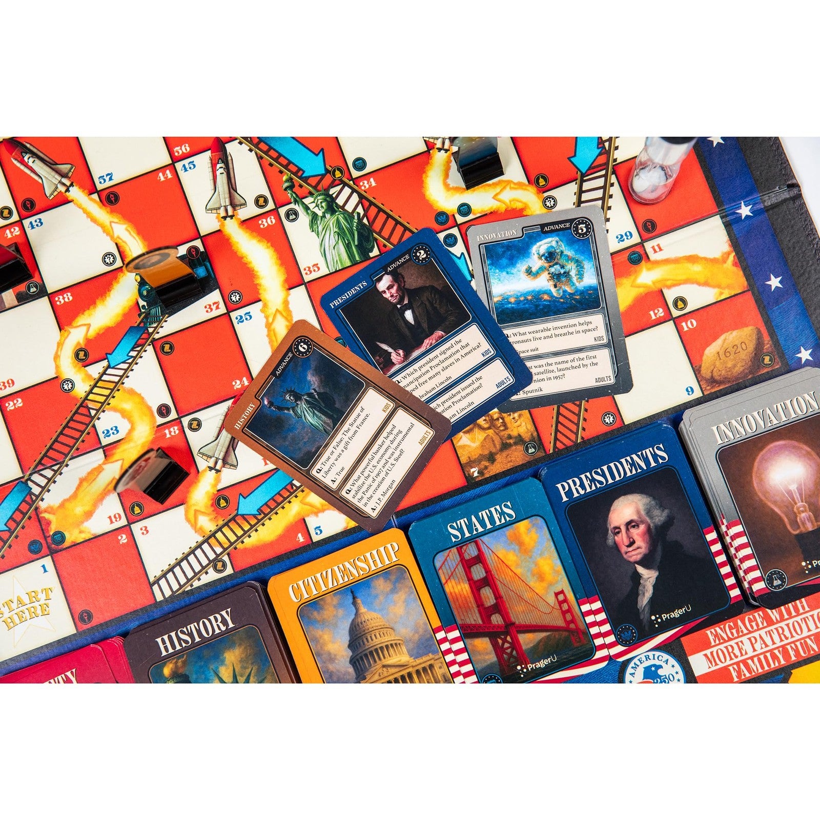 PragerU Celebrate America Race to The White House board game with USA-themed trivia cards and game pieces on a wooden surface.