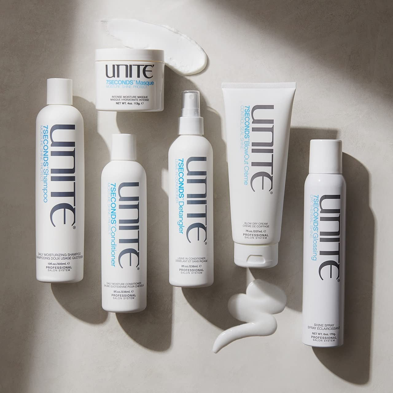 UNITE Hair 7SECONDS BlowOut Crème in a tube, lightweight formula for frizz control, shine, and thermal protection during blow-drying.