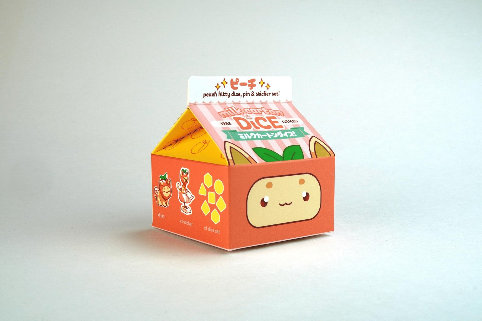 1985 Games Peach Cat Milk Carton Dice Set featuring DND-themed dice designed to look like milk cartons with cat illustrations.