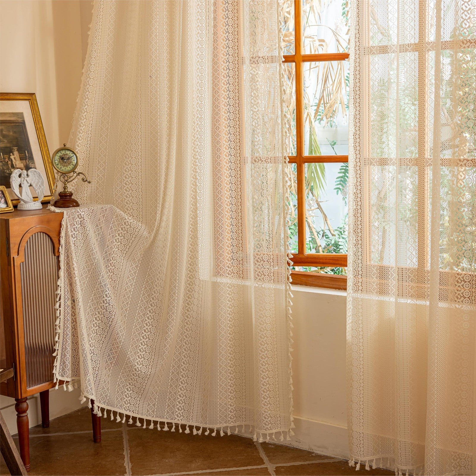 Beige boho vintage lace curtains from Sutuo Home, 108 inches long, hanging in a dining room with intricate lace detailing.