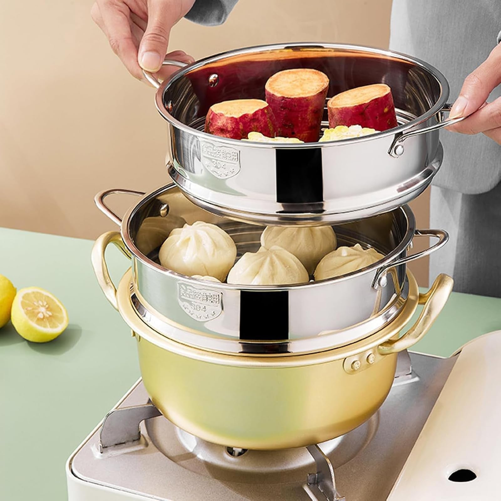 BinaryABC stainless steel dumpling steamer basket for pot, 26cm steamer insert with multiple tiers for steaming dumplings and vegetables.