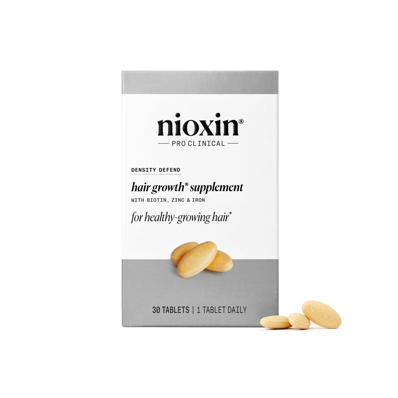 NIOXIN Density Defend hair growth supplements bottle with Biotin, Zinc, and Iron, showing the product label.