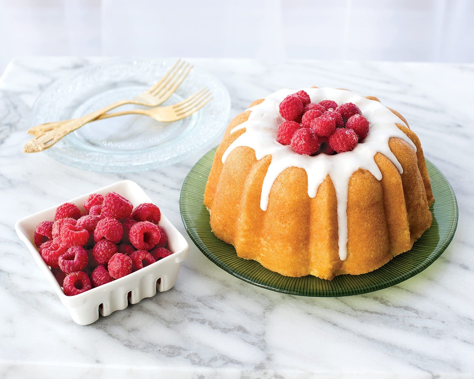 Nordic Ware Platinum Collection 6-cup Bundt pan showing detailed fluted design and non-stick surface for baking.