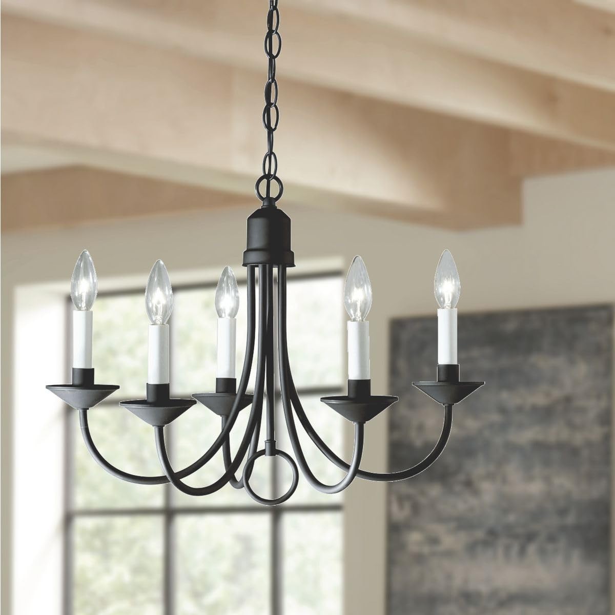 Progress Lighting five-light white candles traditional chandelier with classic design and elegant candle-style lights.
