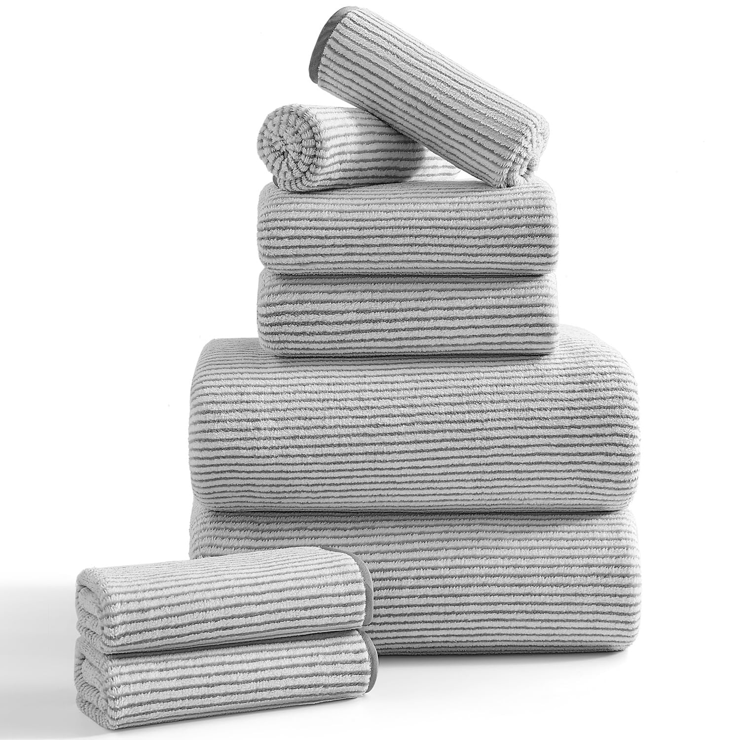Jessy Home 8-piece bathroom towel set with two large bath sheets and two hand towels in soft, plush fabric, displayed folded.