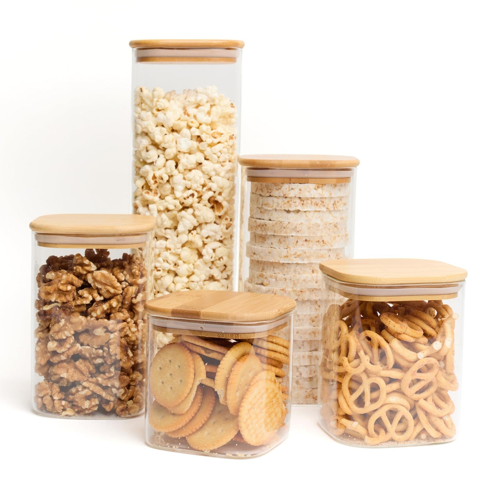 Set of five Livabl glass pantry storage containers with lids and 165 labels for organizing kitchen staples.