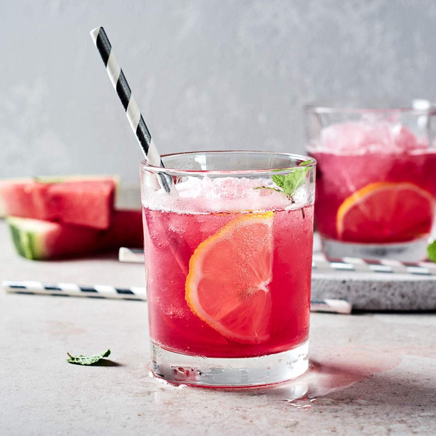 Set of 10 Qappda 7oz clear drinking glasses with heavy bases, ideal for old fashioned cocktails and beverages.