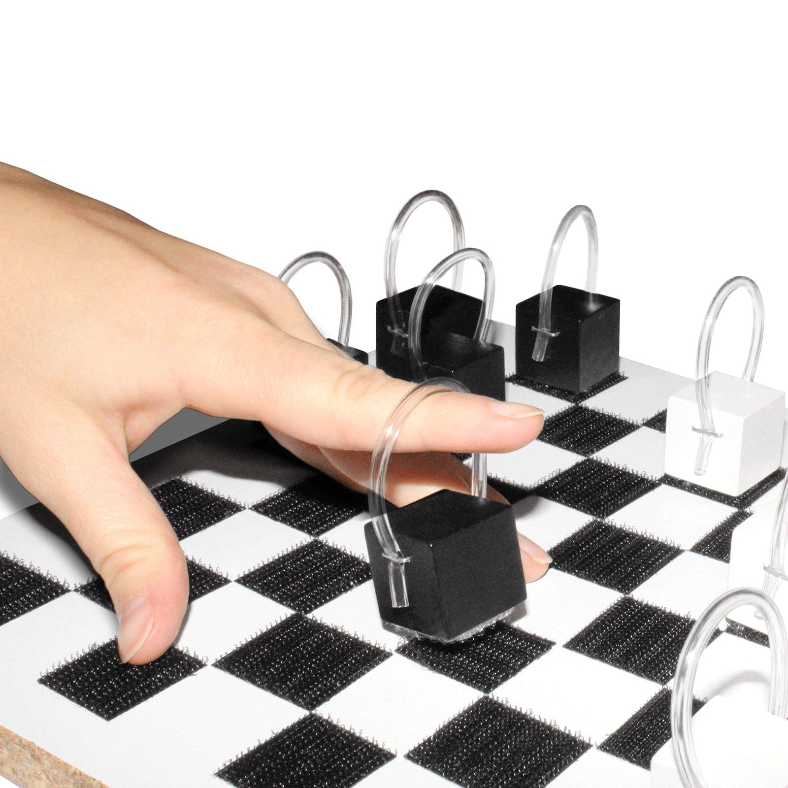 Rehabilitation Advantage black and white finger extending remedial device for finger stretching and rehabilitation exercises.