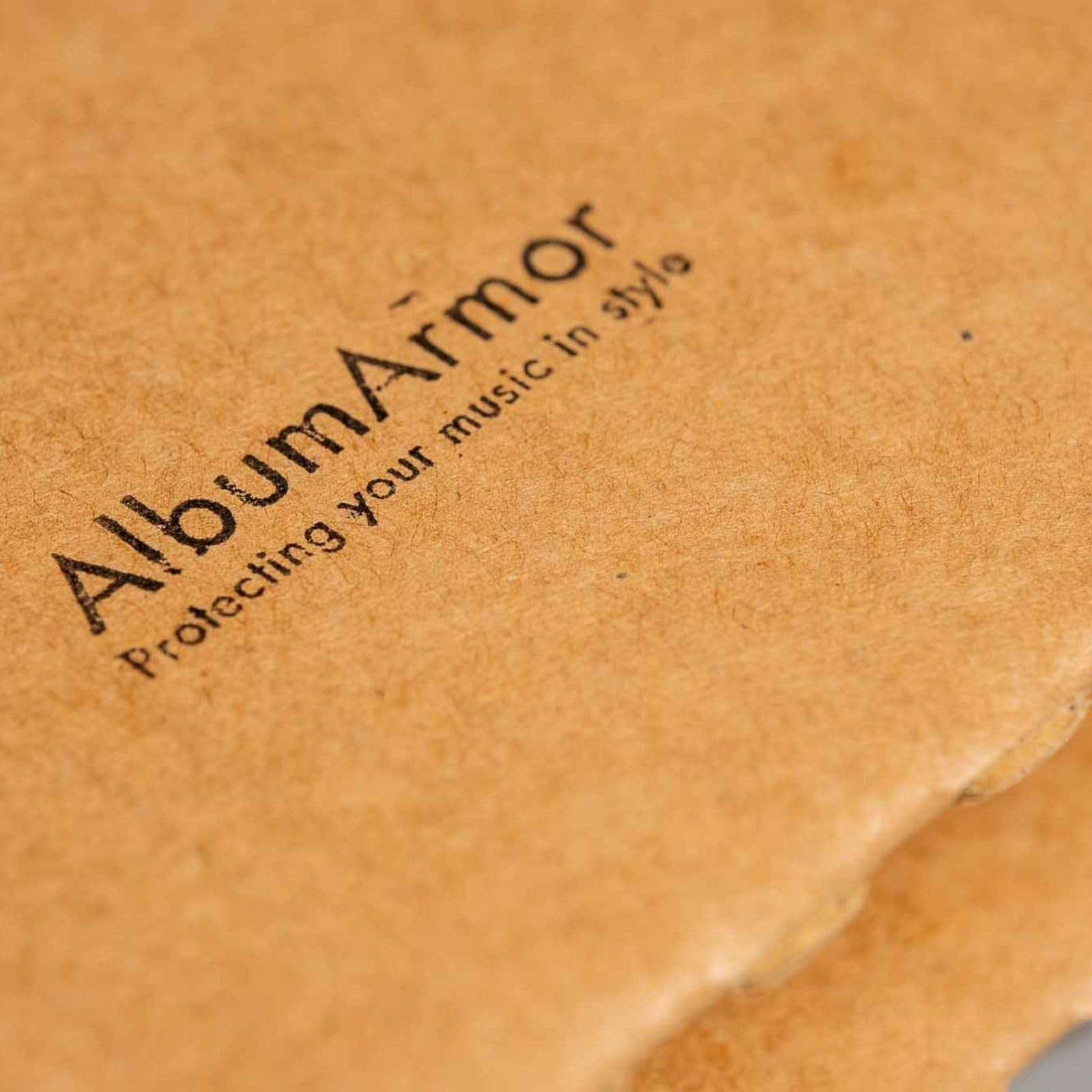 AlbumArmor vinyl record shipping box with fragile stickers and 12-inch LP mailer for safe vinyl record shipping.