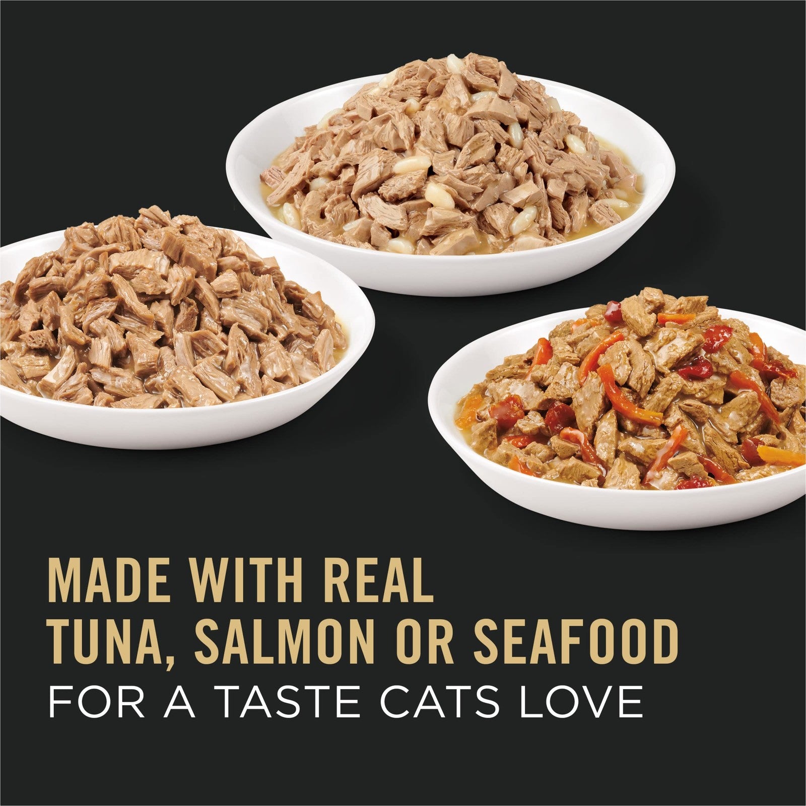 Cans of Purina Pro Plan High Protein Cat Food Complete Essentials seafood wet cat food with colorful labels and seafood imagery