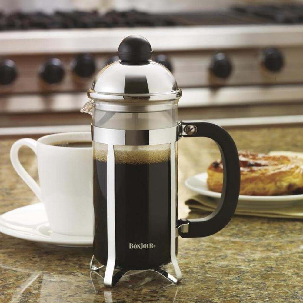 BonJour stainless steel and glass French press coffee maker with 33.8-ounce capacity, featuring a sleek design and durable construction.