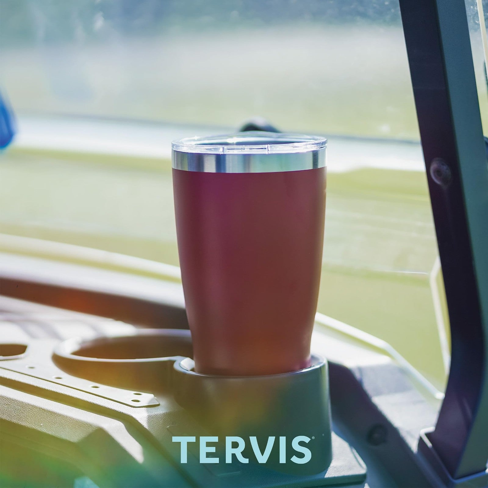 Tervis Traveler Wicked For Good gold triple insulated tumbler travel cup with logo design and secure lid.
