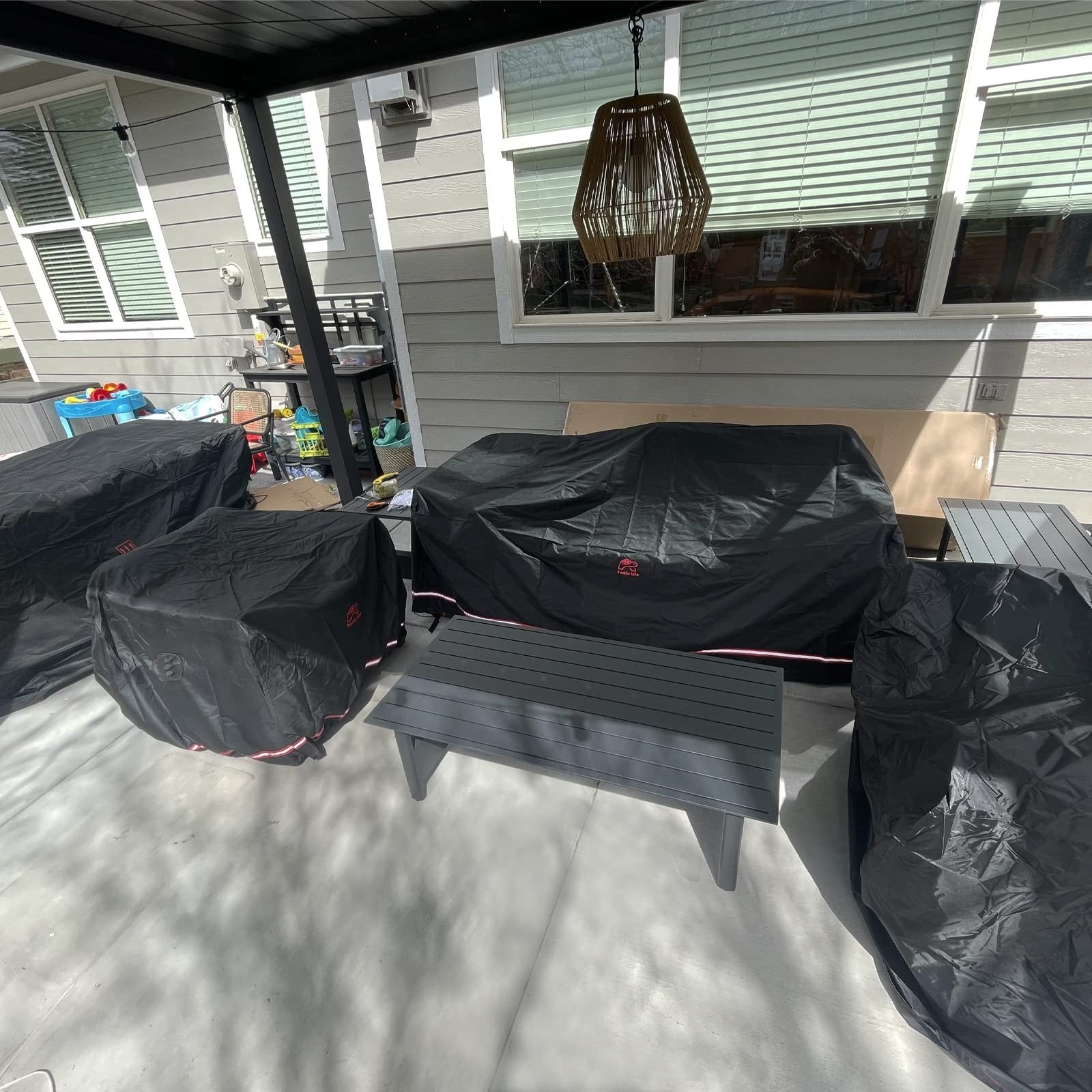 Turtle Life heavy-duty waterproof patio furniture cover for square outdoor furniture sets, durable and weather-resistant.