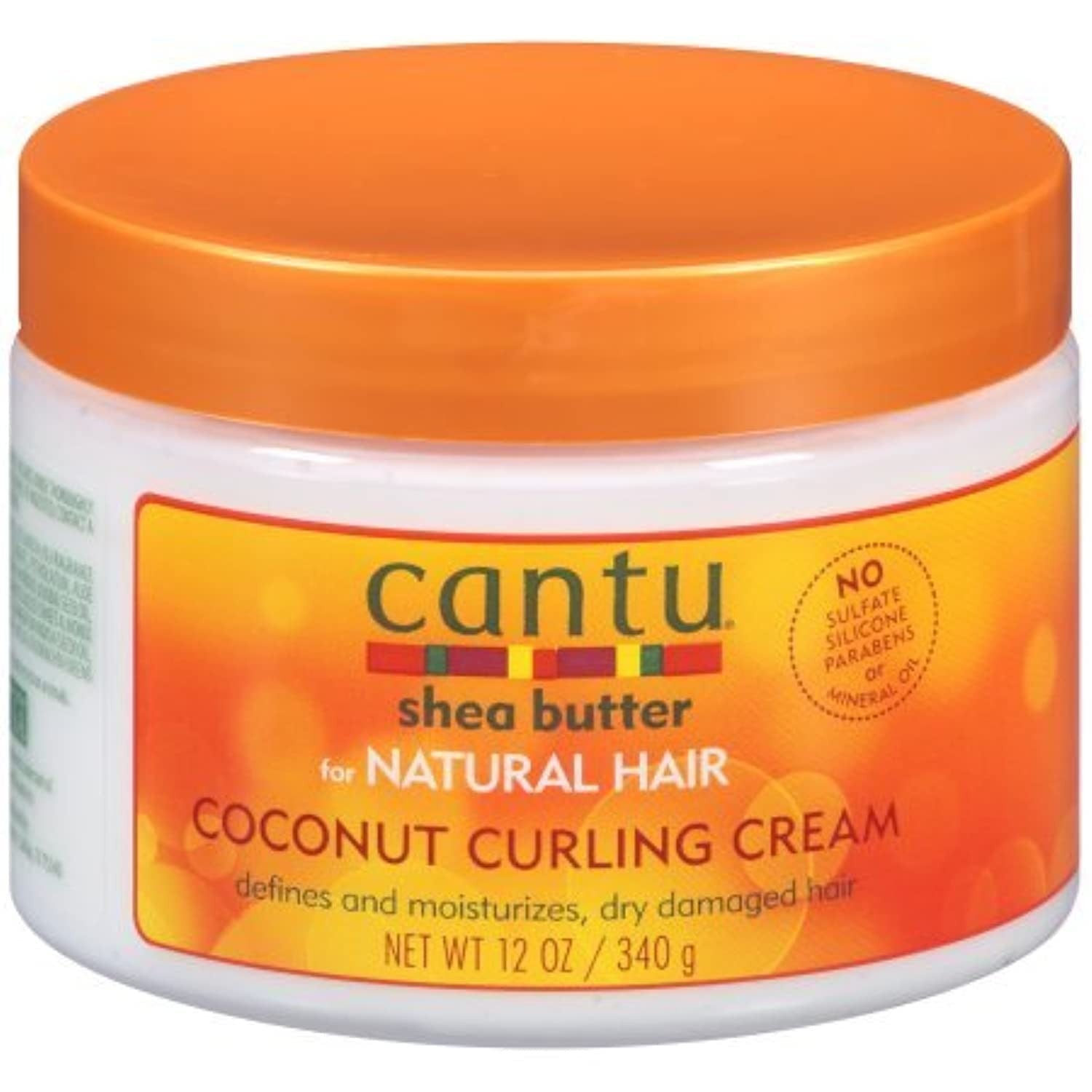 Six 12oz jars of Cantu Coconut Curl Cream for defining and moisturizing curly hair, with creamy texture and coconut scent.