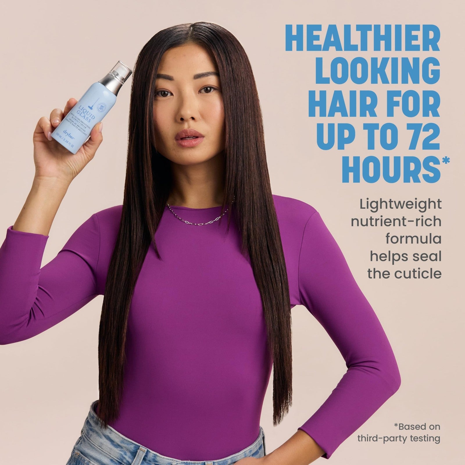 Drybar Liquid Glass High-Gloss Smoothing Blowout Cream applied to hair, reducing frizz and adding sleek shine for a smooth finish.