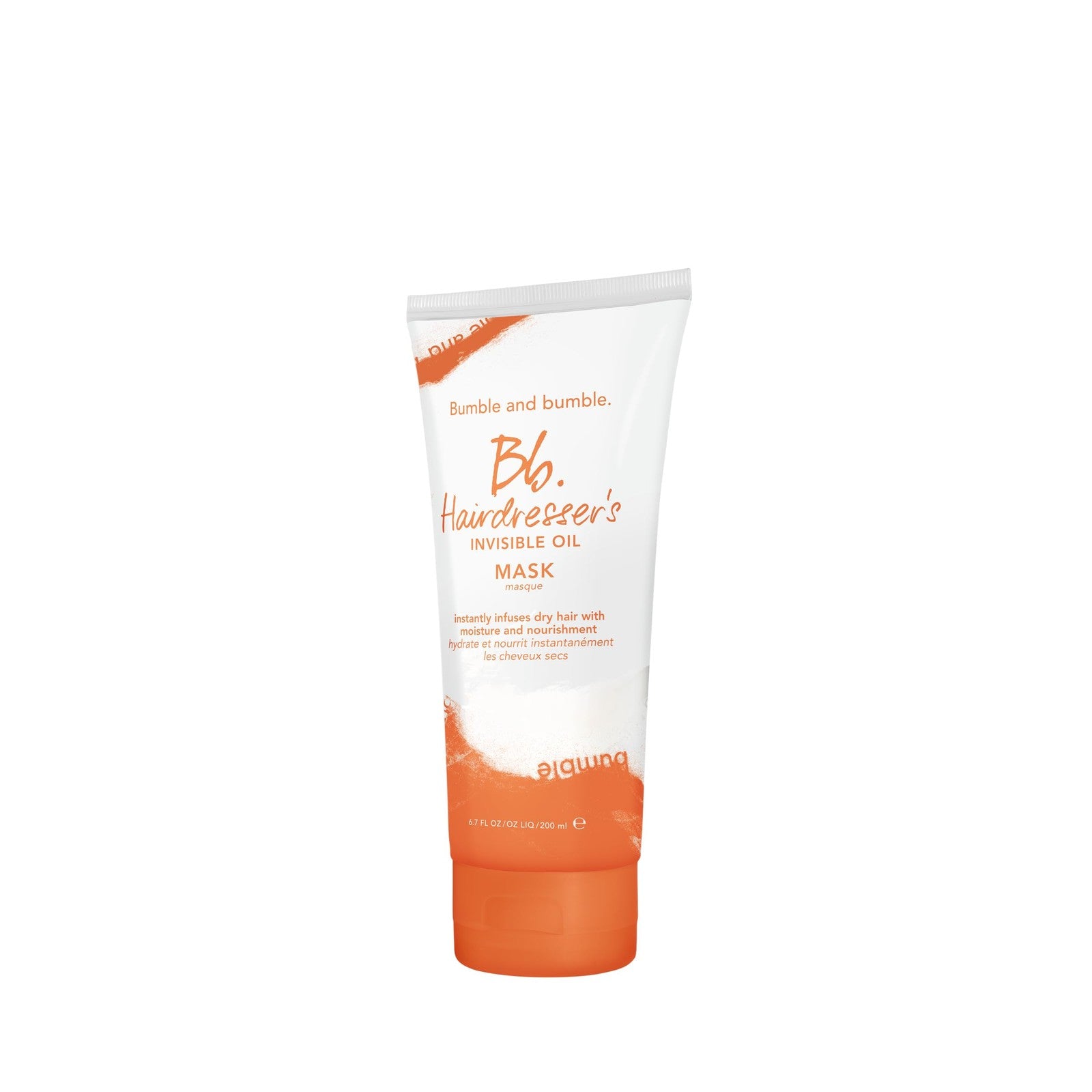 Bumble and bumble Hairdresser's Invisible Oil Hydrating Hair Mask applied to damp hair, showing smooth, healthy strands.