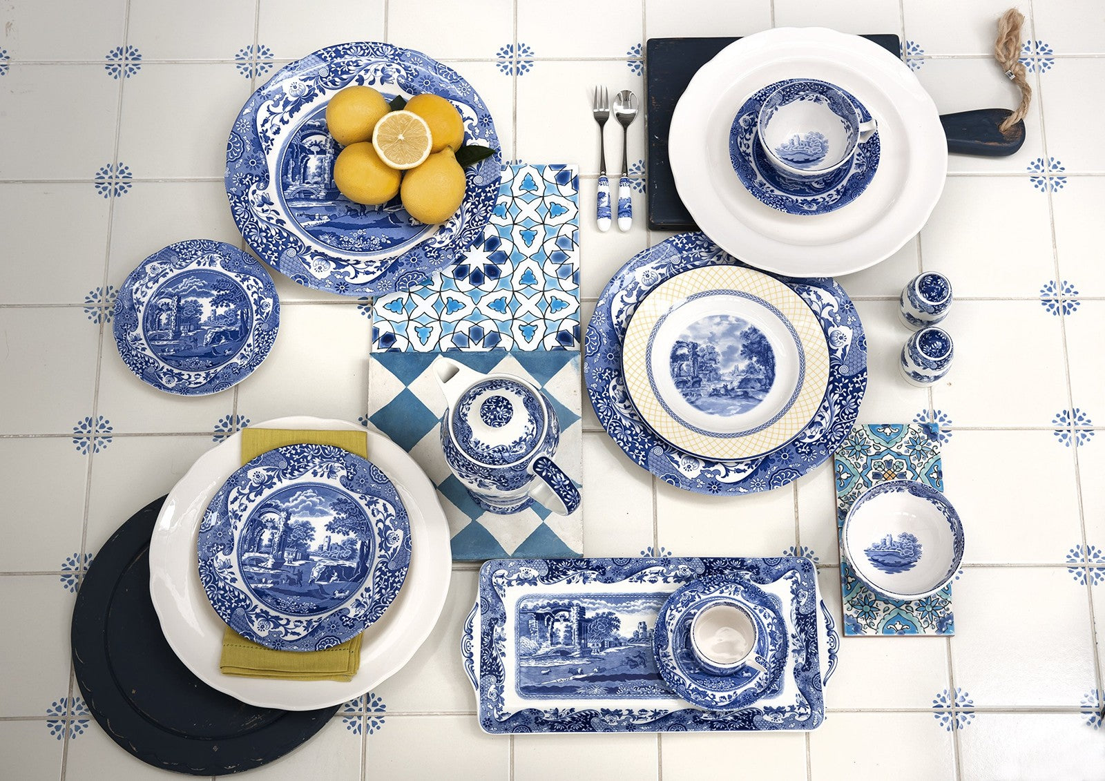 Spode Blue Italian 9 oz ceramic gravy boat with matching saucer featuring classic blue and white Italian pattern.