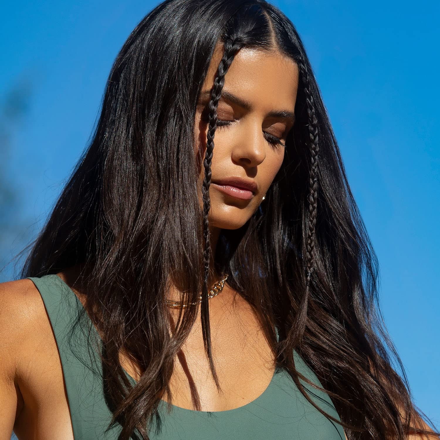 UNITE BEACH Day natural sea salt spray bottle with tousled textured hair and a relaxed beachy look.
