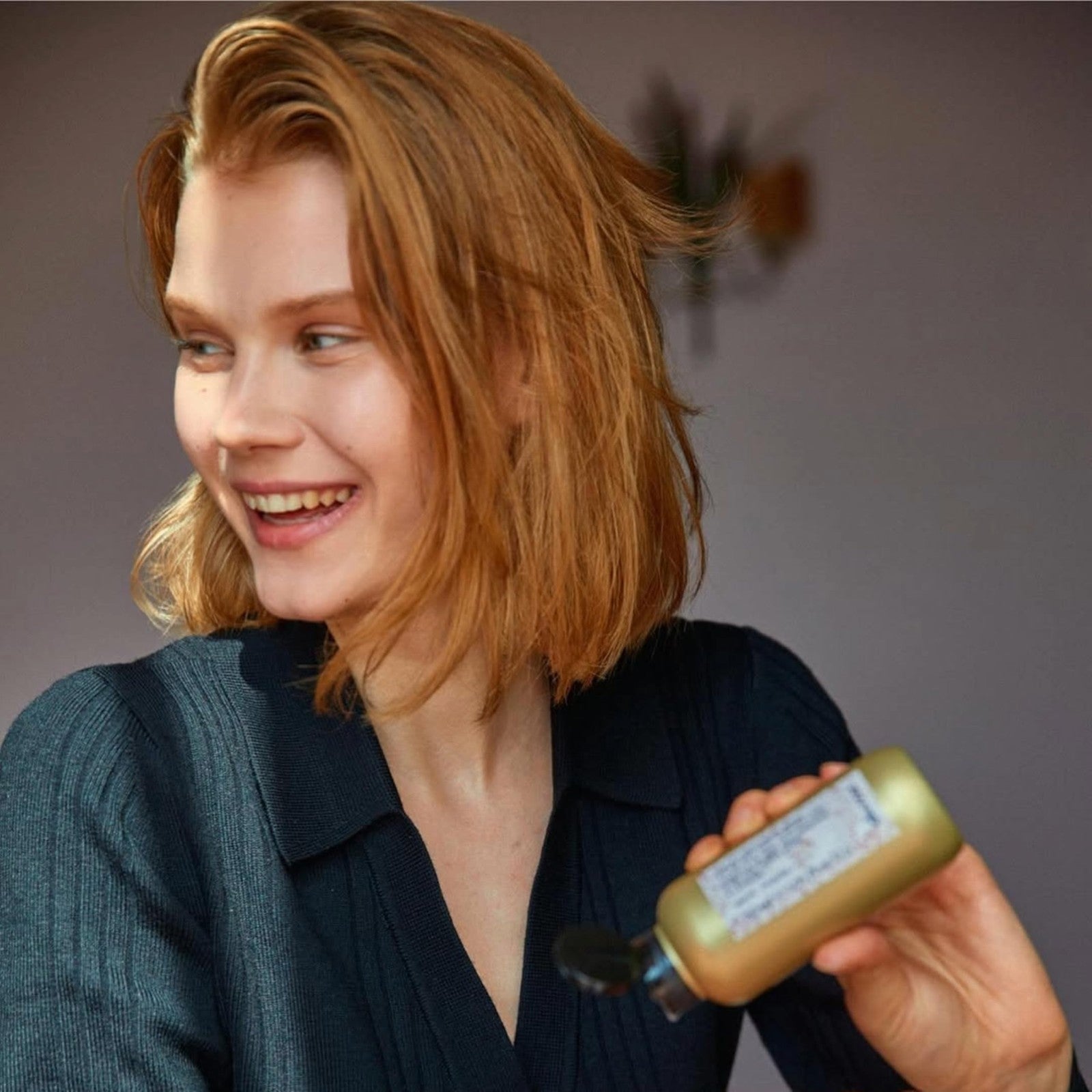 Davines This is a Texturizing Serum bottle with a pump dispenser, designed to add body and texture to hair.