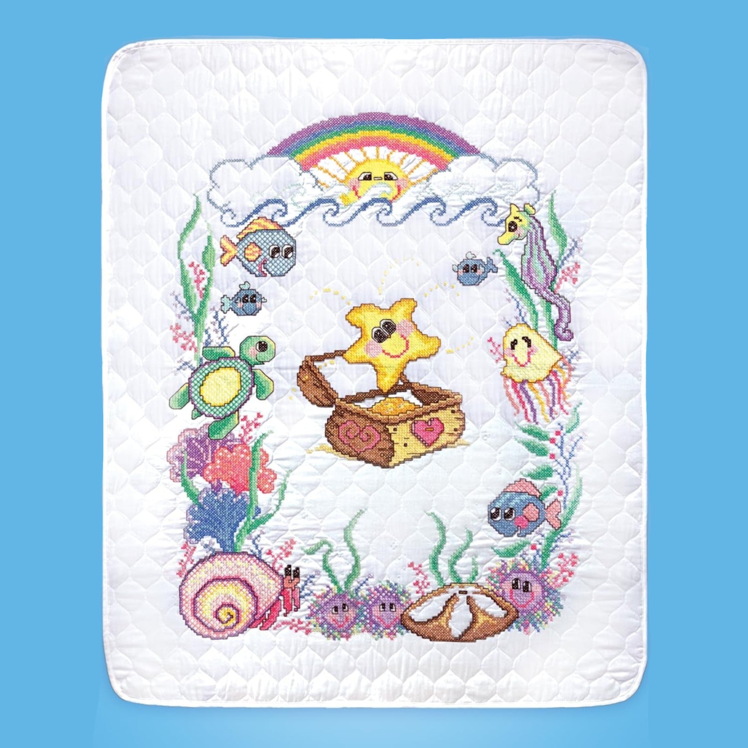 Design Works Crafts "A Star is Born" stamped cross-stitch baby quilt kit with star pattern and embroidery supplies.