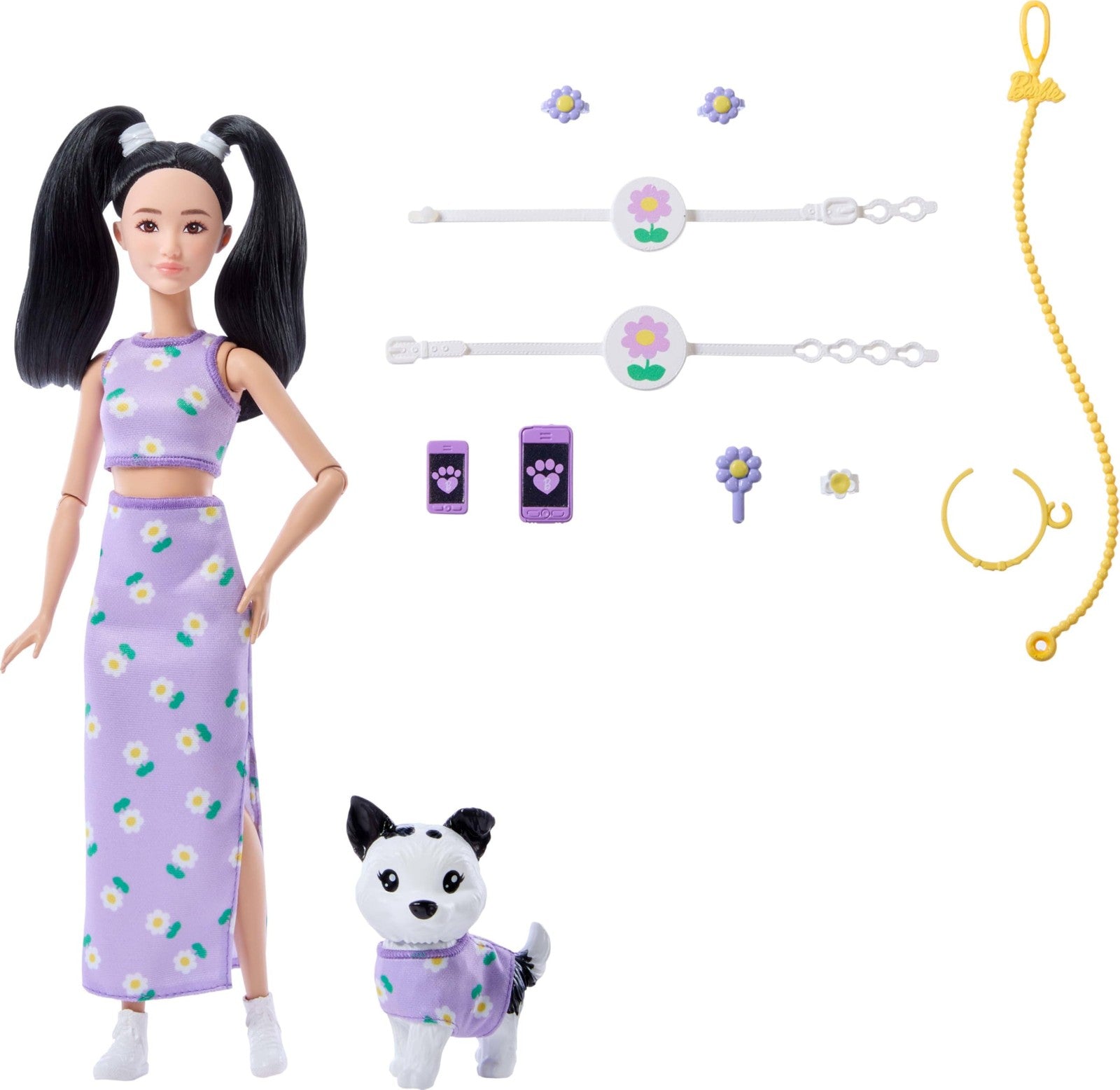 Barbie Twinning Looks doll and pet dog in matching purple daisy outfits, featuring coordinated clothing and accessories.
