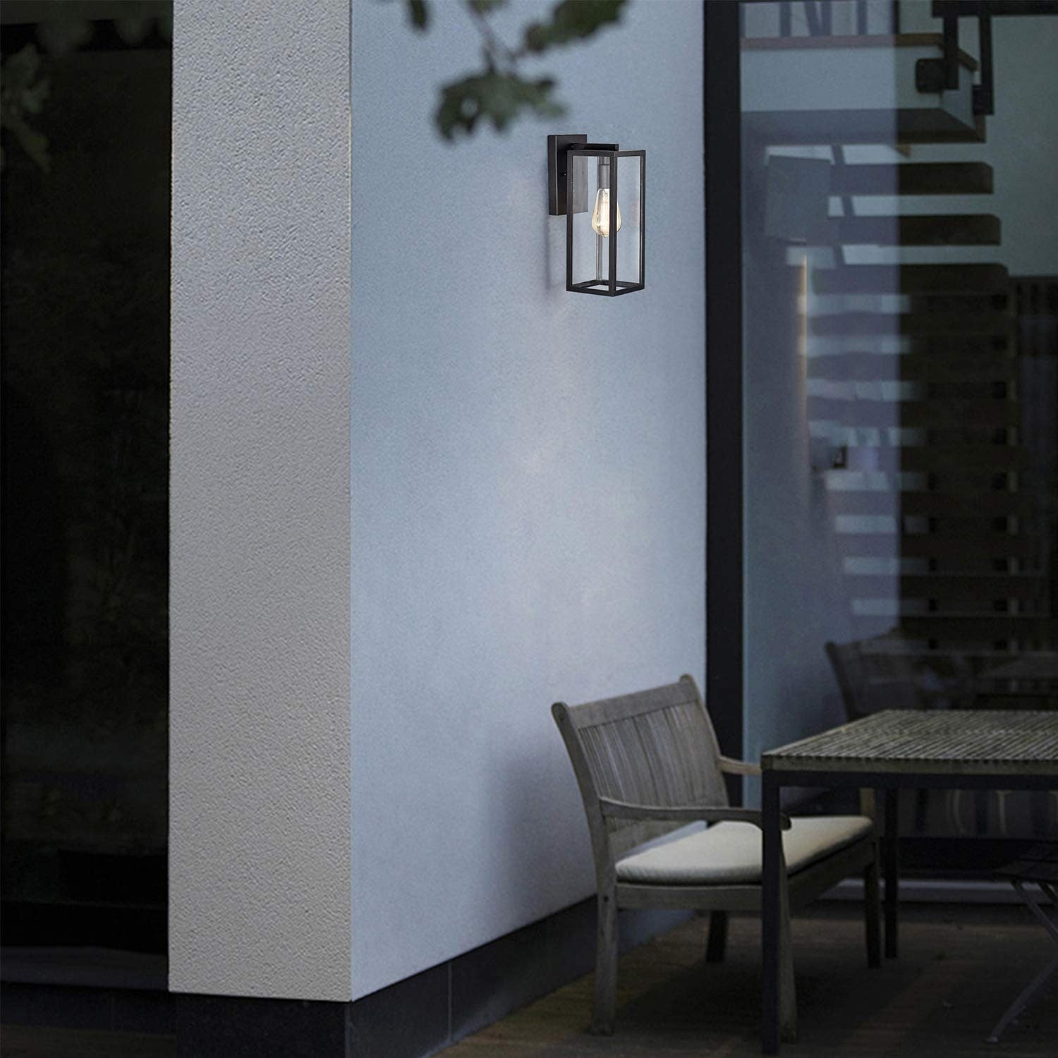 Dusk to Dawn outdoor wall mount lantern by Micsiu, 14.5-inch exterior lighting fixture with classic design, mounted on a wall.