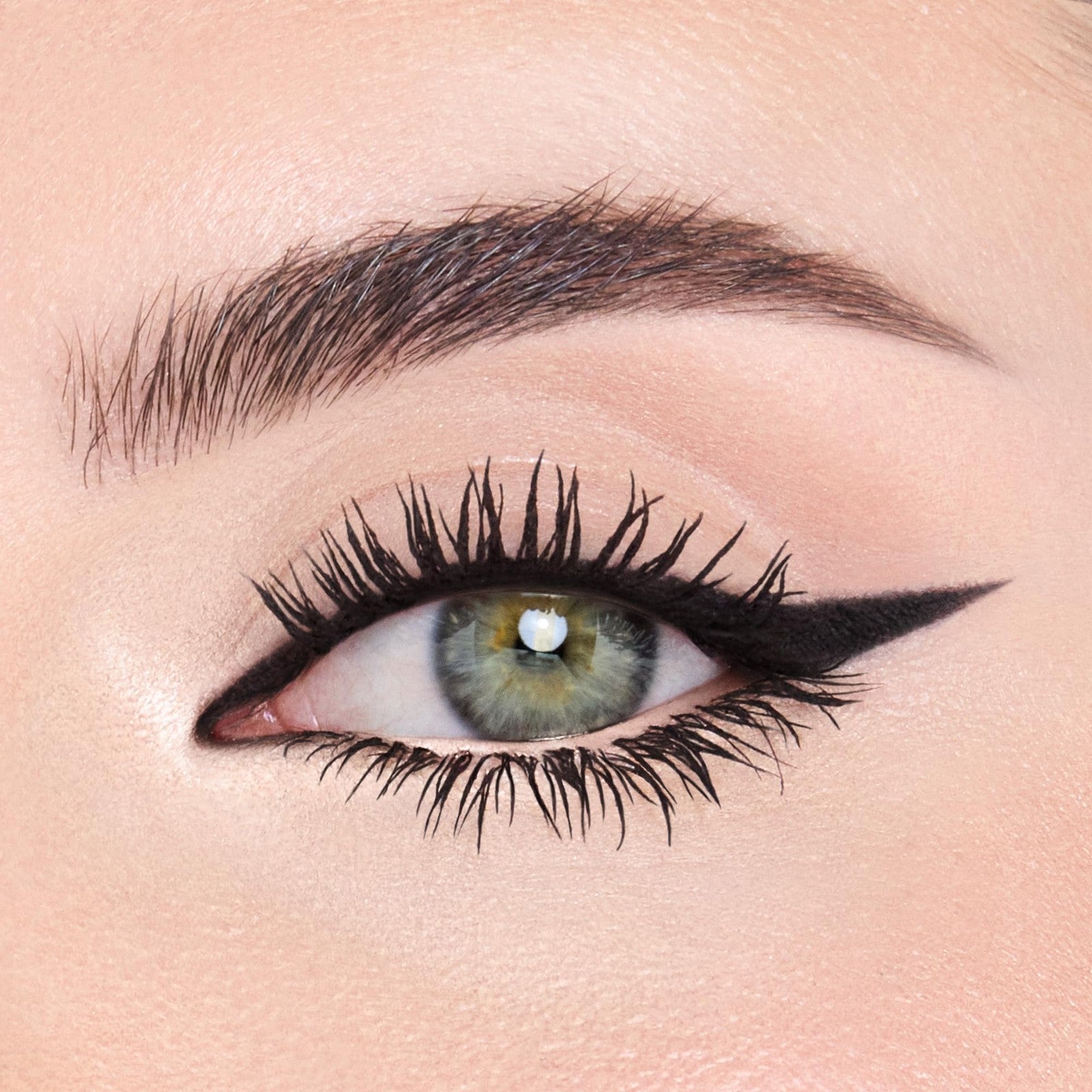 Charlotte Tilbury Exagger-Eyes Eyeliner Duo with dual-ended smudge-proof eyeliners in black and brown shades.