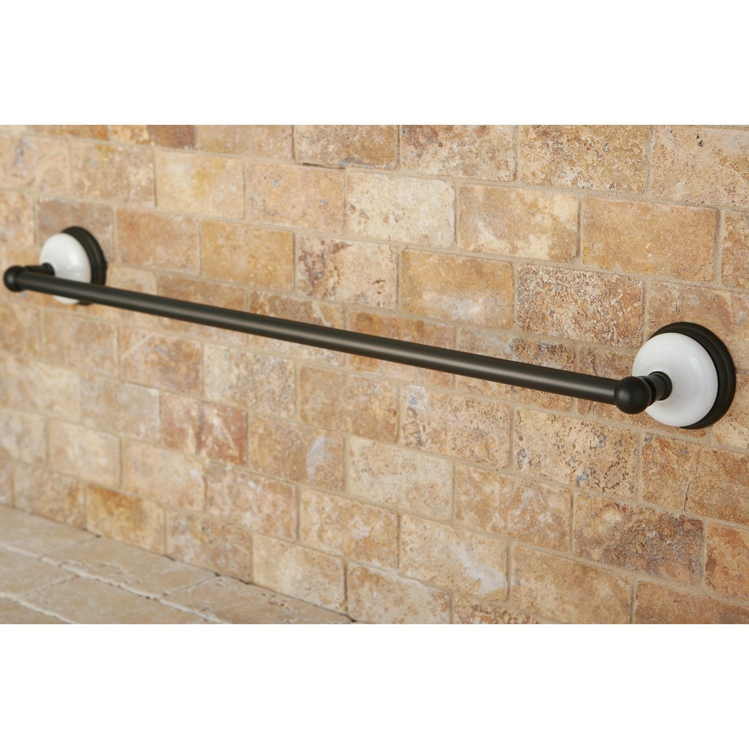 Kingston Brass Victorian 24-inch towel bar in oil rubbed bronze finish, mounted on a bathroom wall with a vintage style design.