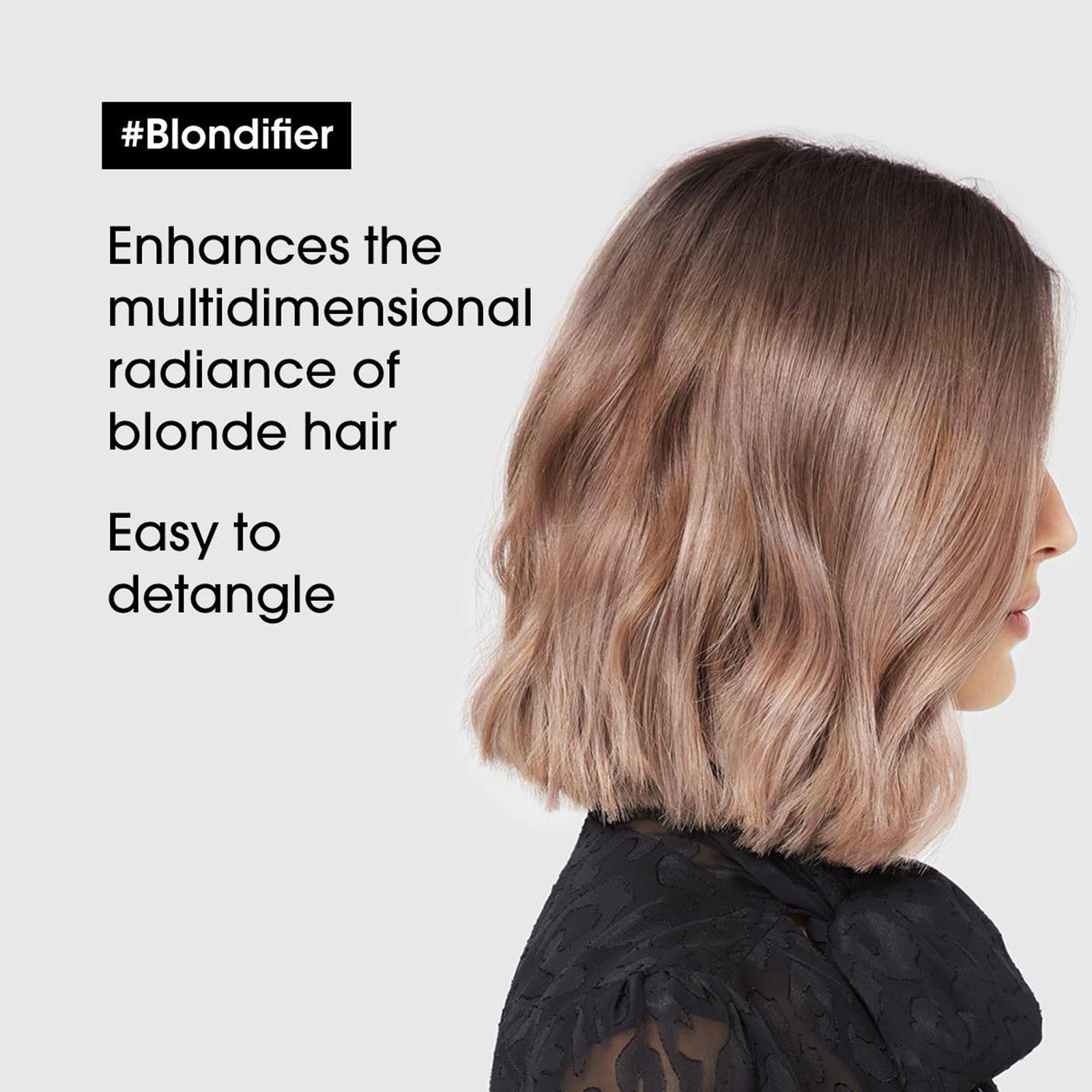 L'Oréal Professionnel Paris Blondifier Conditioner bottle with nourishing and smoothing formula for blonde hair care.