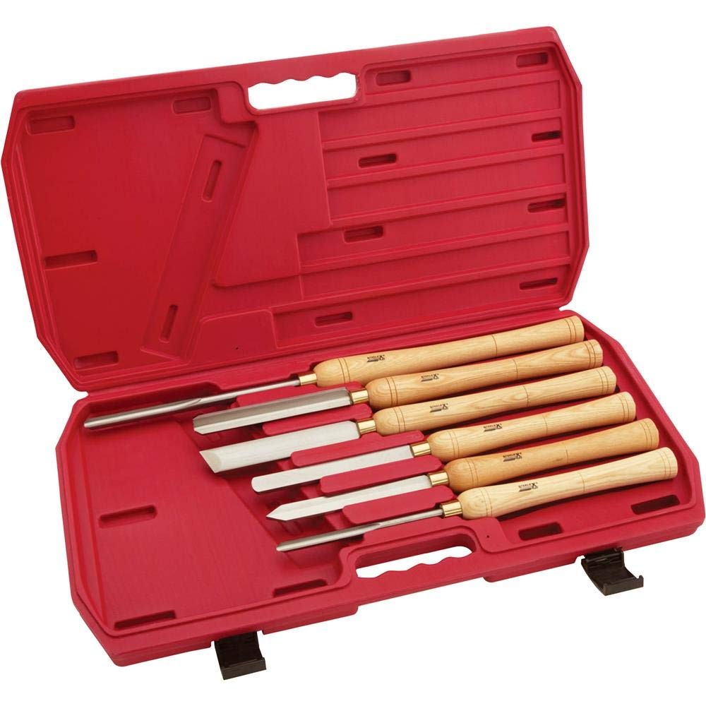 Set of six Steelex Plus D2304 Deluxe HSS lathe chisels displayed on a workbench for woodworking projects