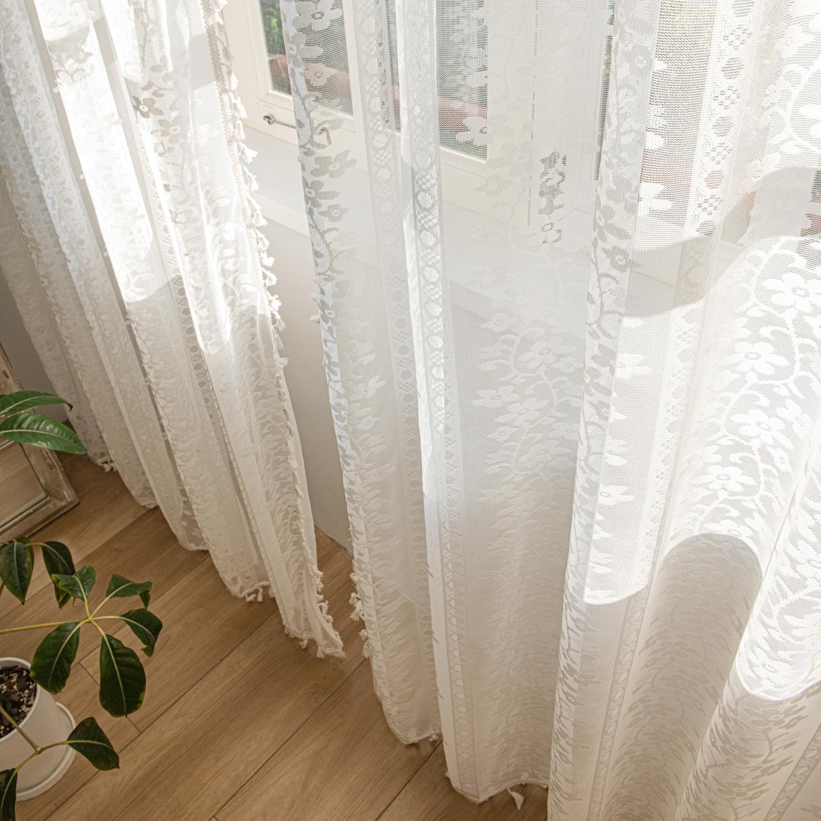 Sutuo Home boho curtains with two 84-inch floral crochet panels featuring macrame design for window decoration.