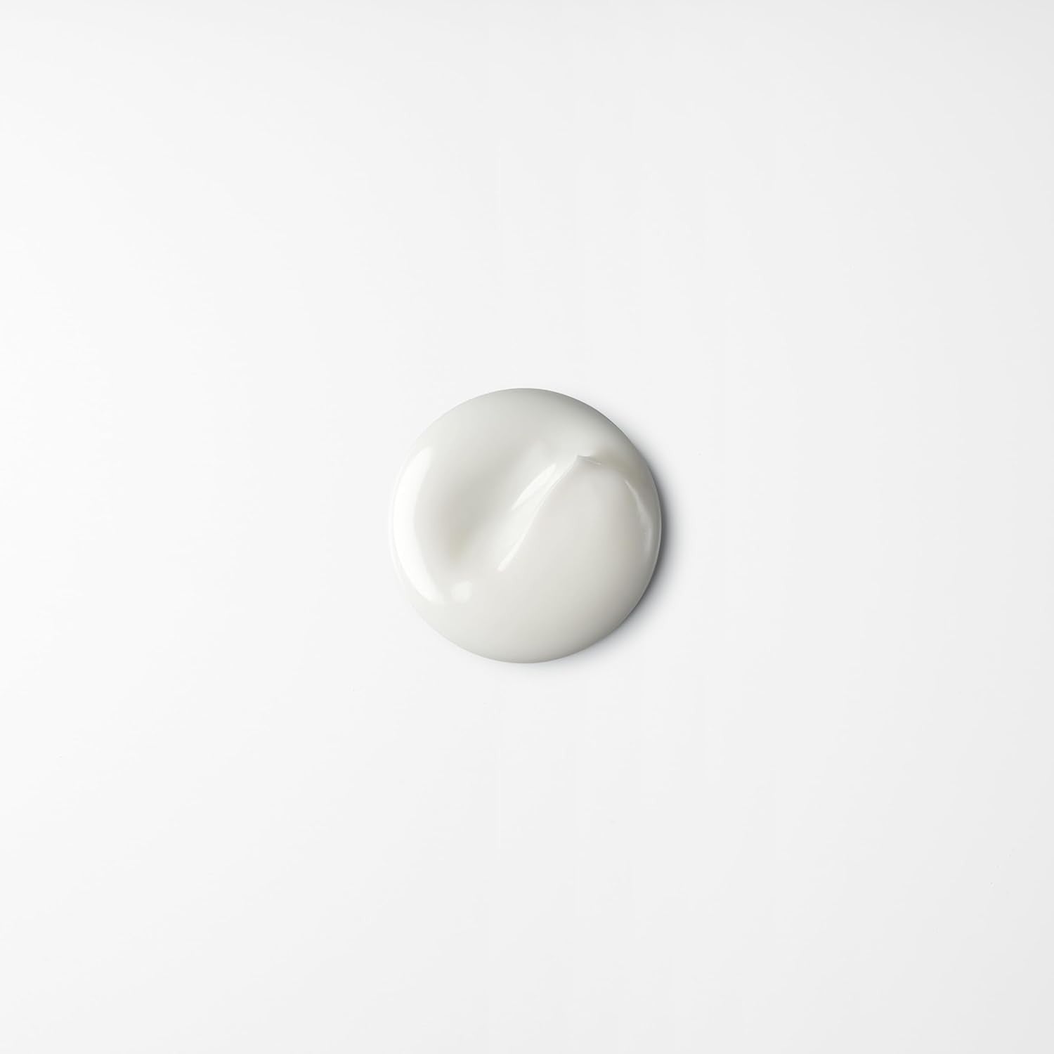 shu uemura art of hair Uzu Cotton Definition Cream in a jar, showing the anti-frizz, flexible hold hair styling product.