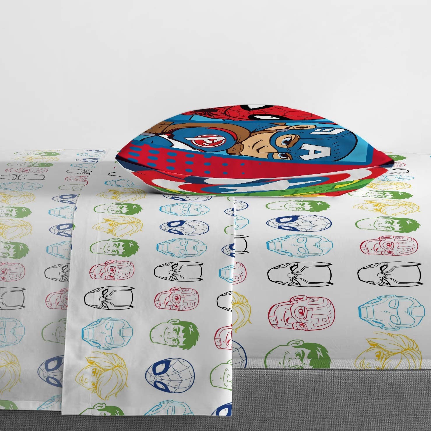 Jay Franco Marvel Super Hero Adventures toddler bed set with colorful superhero illustrations on blue and red fabric.