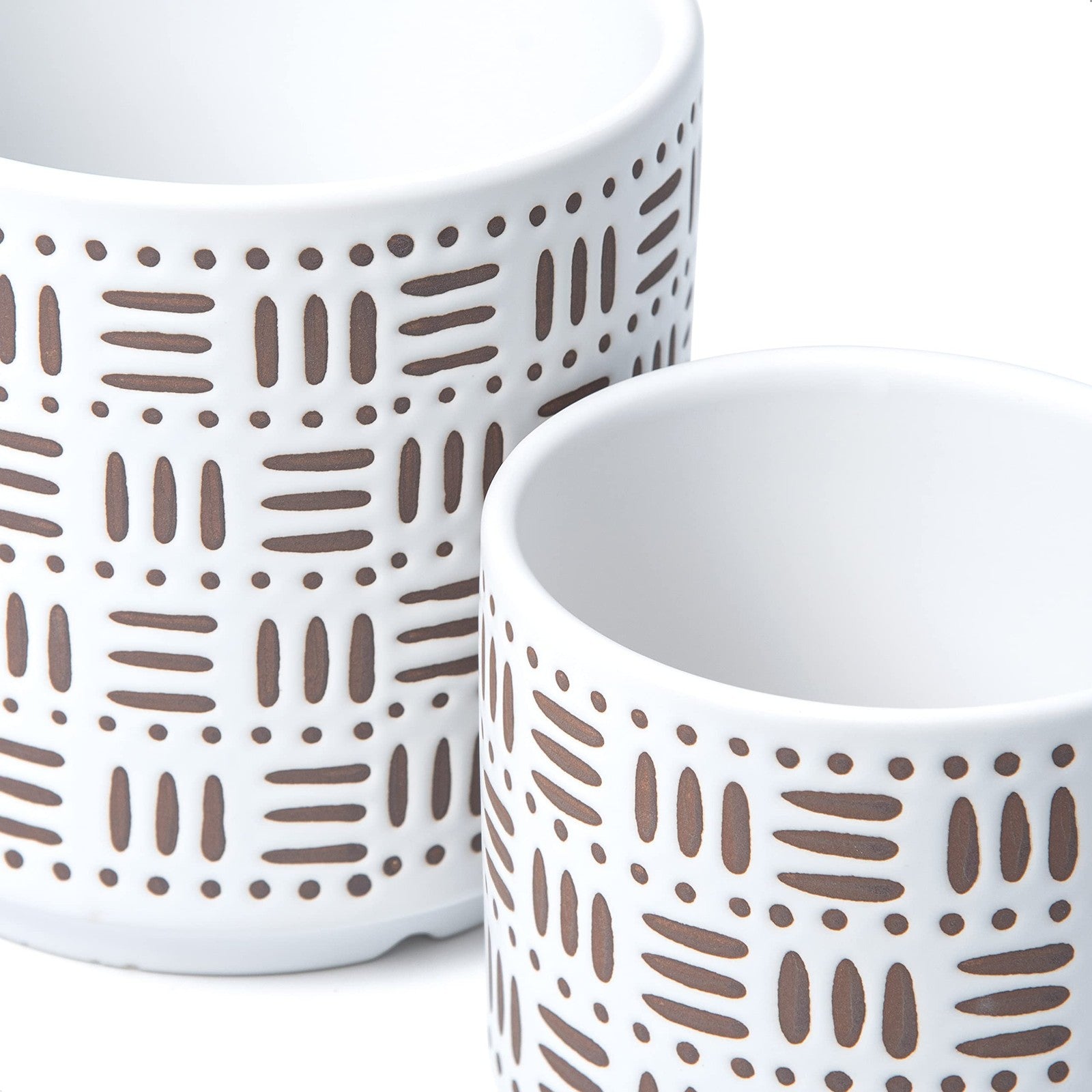 D'vine Dev ceramic planter pots with drainage holes and saucers, 4.5 inches, perfect for indoor plants and home decor.