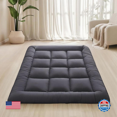 Foldable grey Shouren Japanese floor mattress, portable roll-up futon mattress ideal for versatile sleeping and lounging.