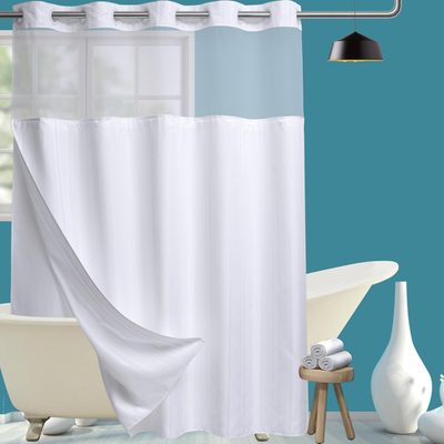 Unbranded Conbo Mio Extra Long No Hook Waffle Weave Shower Curtain and Snap-In Liner set hanging in a bathroom.