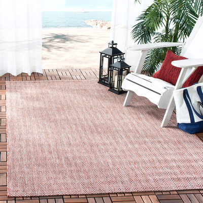 Safavieh washable outdoor rug from the Courtyard Collection, square shape with red and beige geometric pattern.