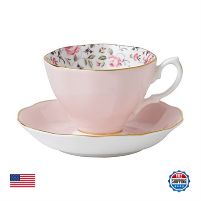 Royal Albert Rose Confetti teacup and saucer set with floral pattern and delicate design on white porcelain.