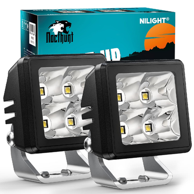 Pair of Nilight 2-inch motorcycle LED pods with 20W spot beams, mini driving and work lights for off-road and motorcycle use.