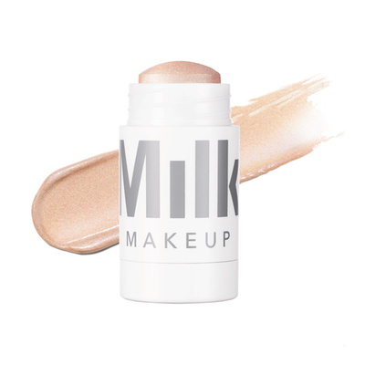 Milk Makeup highlighter stick with a creamy, shimmery formula for radiant glow on face and body.