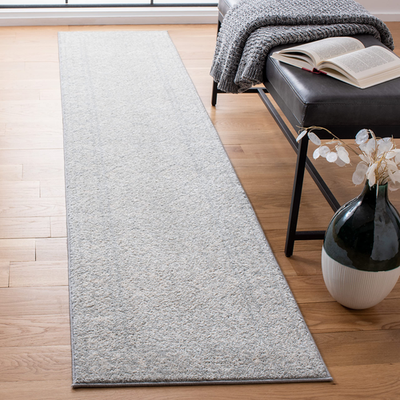 Safavieh Tulum Collection runner rug in light grey and ivory with Moroccan boho pattern, 2x9 feet.